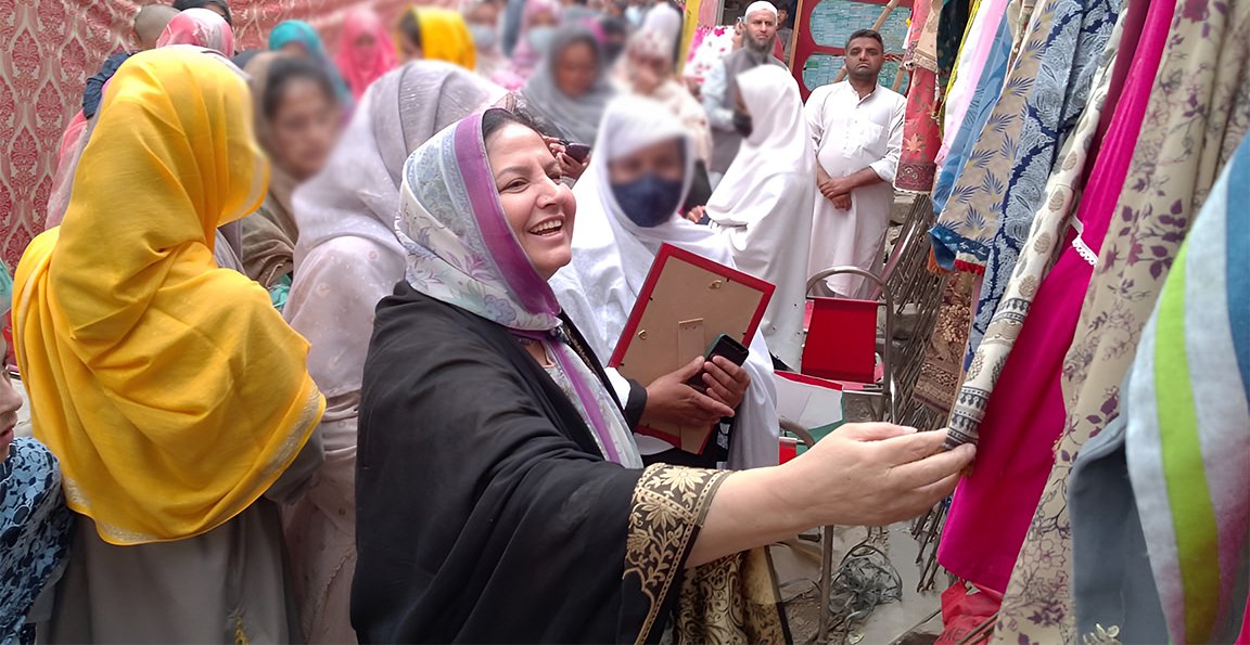 "Imtiaz Naseem, Minister of AJ&K Government, visiting the tailoring course exhibition by Jamil Khan Welfare Organization at Hasina Sewing Center."